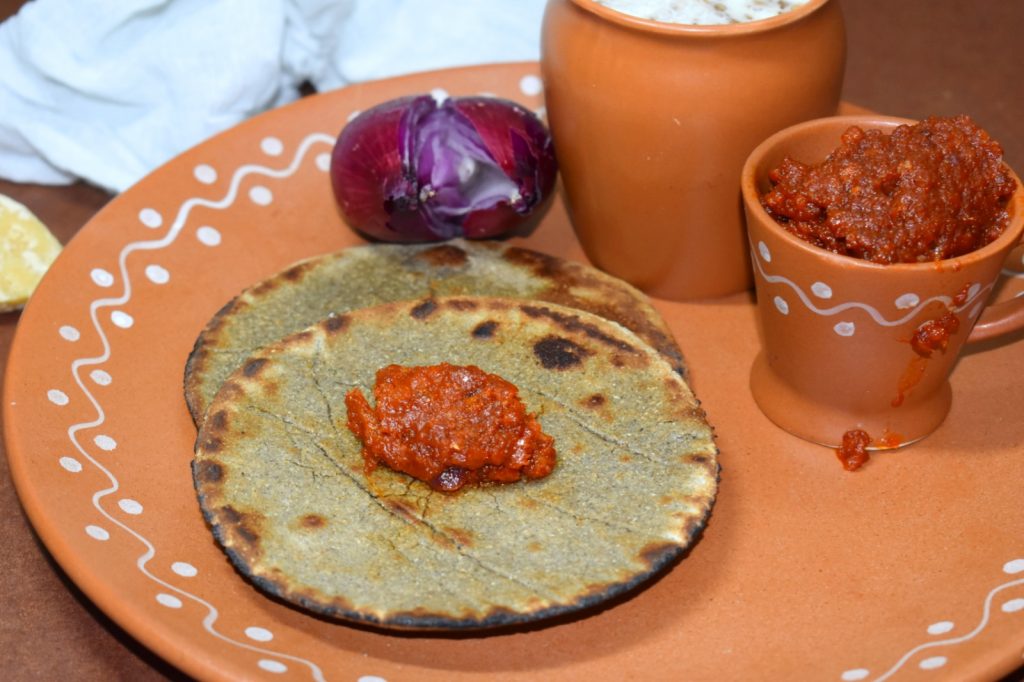 Bajre Ki Roti served with tangy Lehsun Ki Chutney, a staple part of the best food in Jaipur.