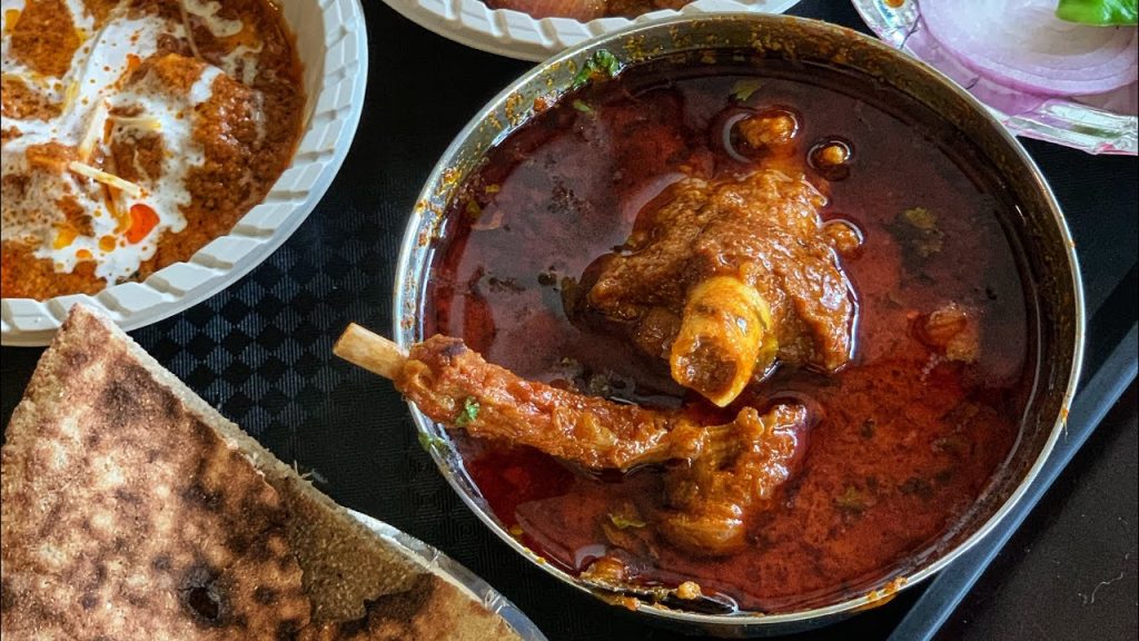 A bowl of Laal Maas, a spicy and rich Rajasthani mutton curry.