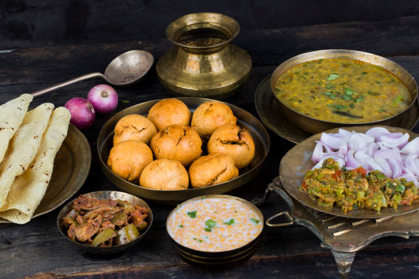 Dal Bati Churma with lentils and sweet churma, a traditional dish from Rajasthan.